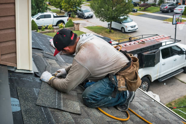 Professional Roof Replacement technician working in Menlo, WA